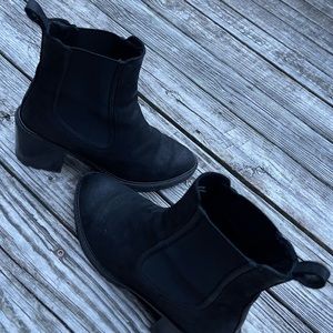 Black leather Chelsea  pull on boots.